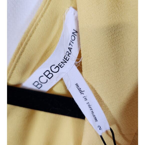 BCBGeneration NWOT $118 Size 2 Butter Yellow Ruffle Sleeve & Hem Mini Dress - Picture 8 of 11